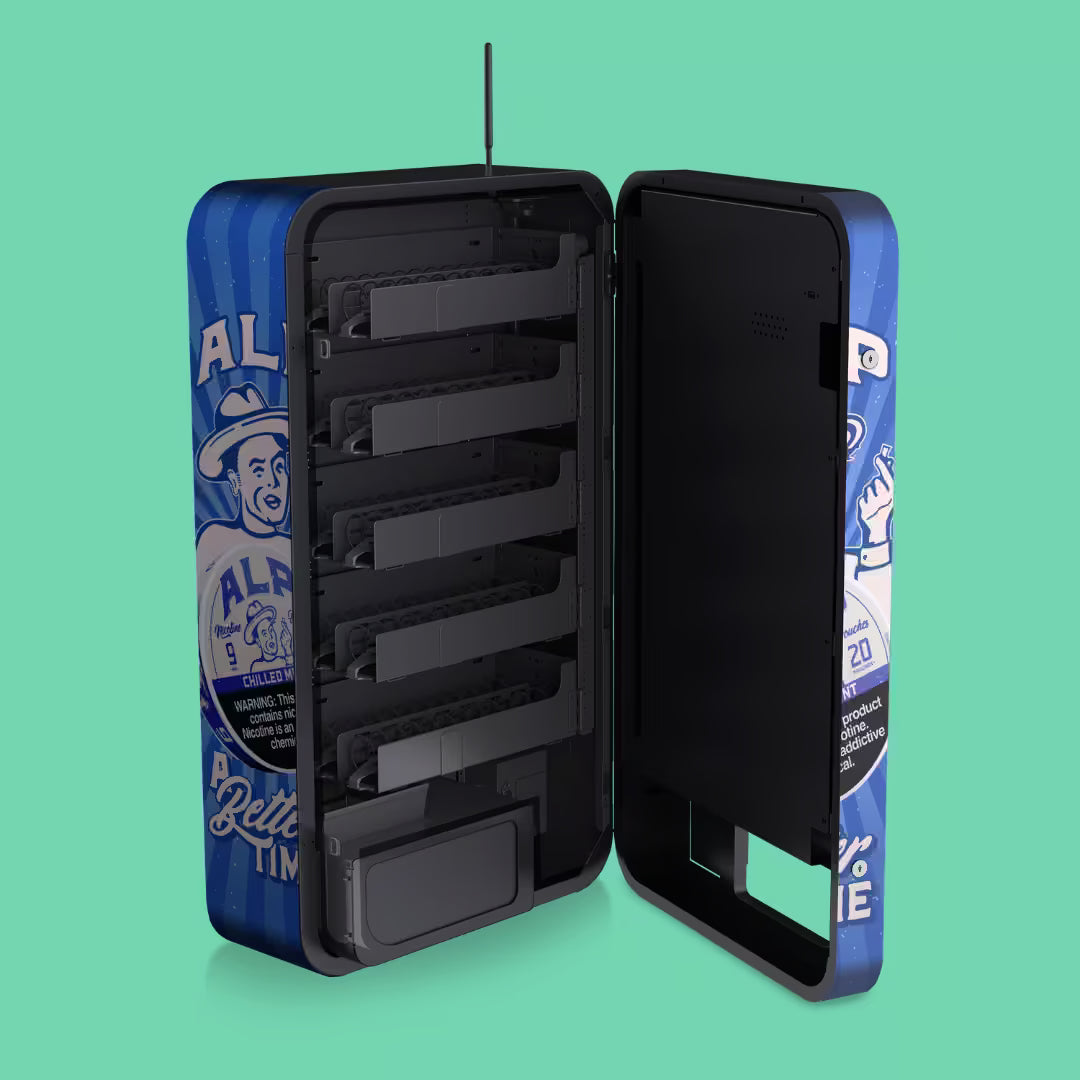 Interior of ALP vending machine with door open, showing coil system, tray configuration, and storage layout for nicotine pouch products.