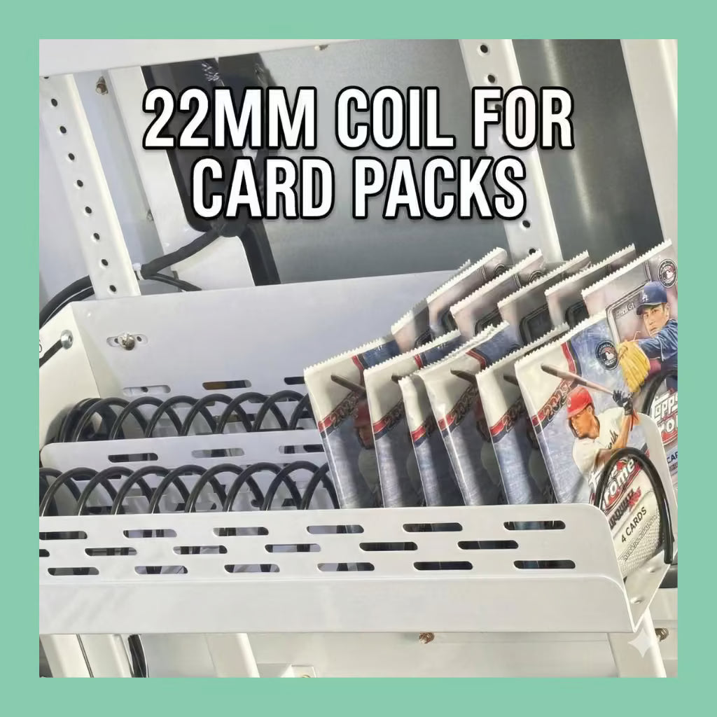 22mm vending machine coil holding trading card packs, shown installed in a card vending machine tray