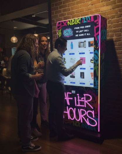 After Hours Slim Tower — sleek digital vape vending machine with 43-inch touchscreen, glowing graffiti design, and people buying products in a nightlife lounge.