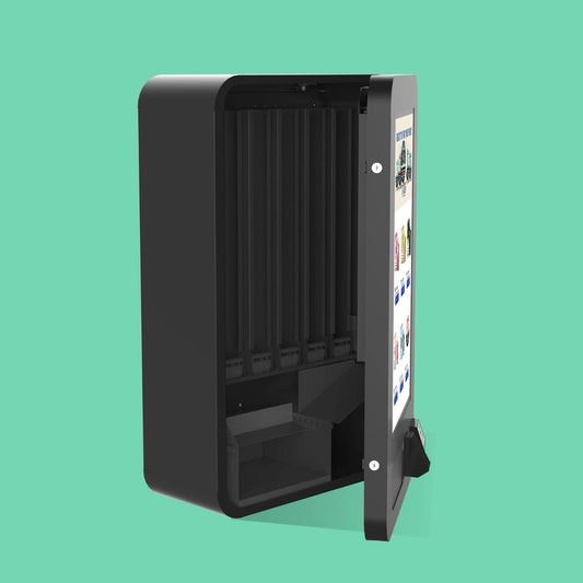 Side view of a compact black vending machine with open door, showing empty product slots and digital display.
